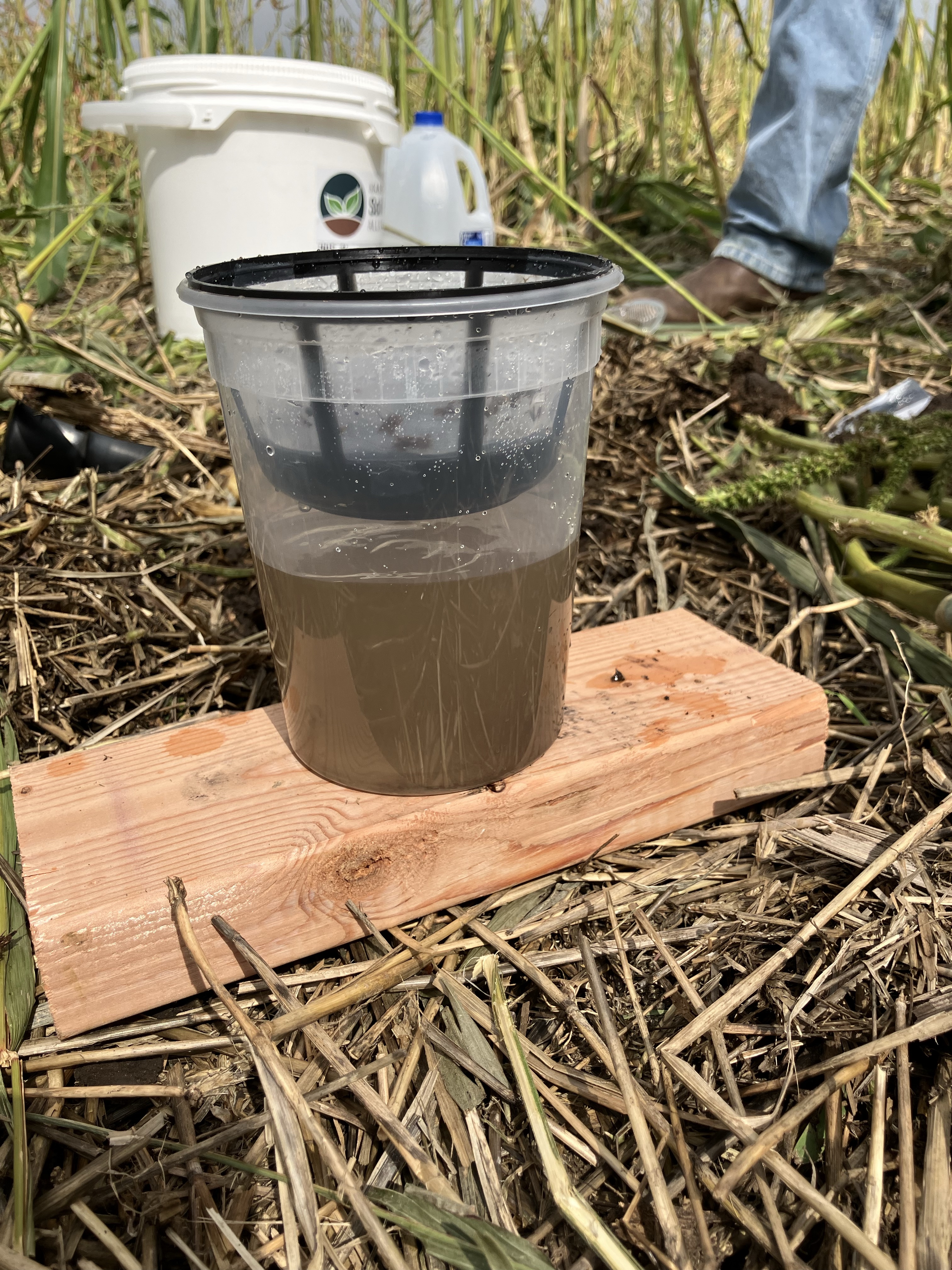 Water infiltration demonstration at the Kansas Soil Health School.